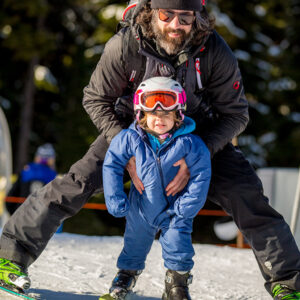 Dad and Daughter Skiing